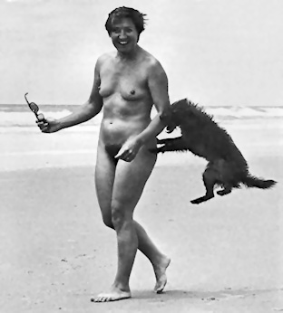 Edna Roland with a dog on the beach