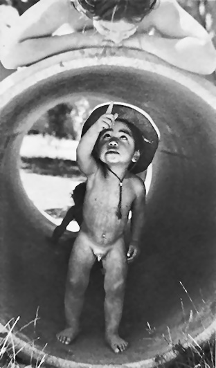 Kid in a big pipe