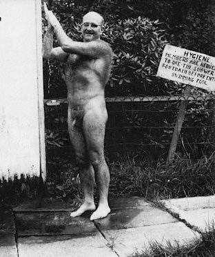 A man showering ahead of a dip