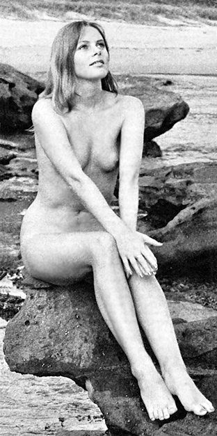 Girl on a rock at the seaside